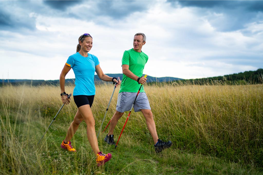 A man and a woman exercising together.