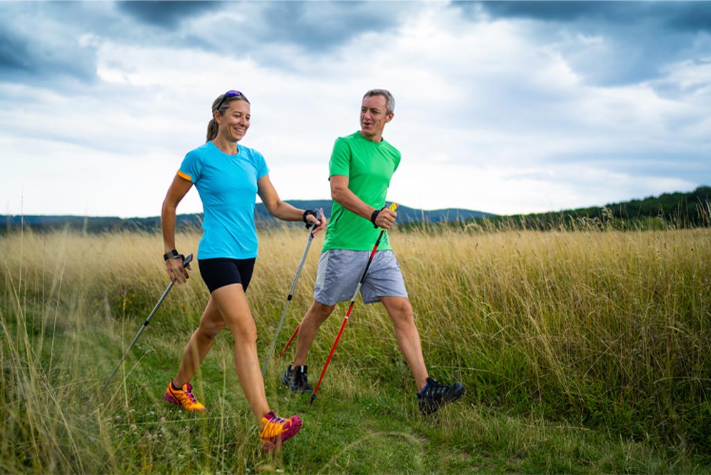 A man and a woman exercising together.