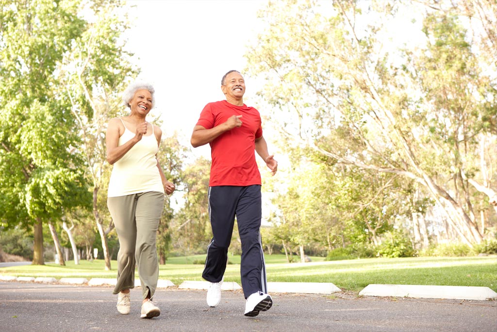 A man and a woman going for a jog together.